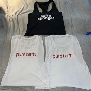 Three Pure Barre cropped tank tops